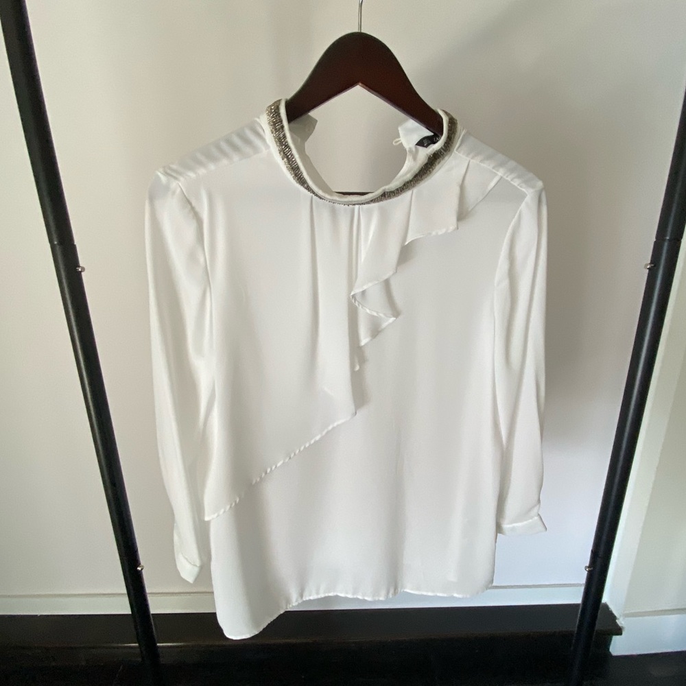 Beautiful brand new blouse with sequins on collar